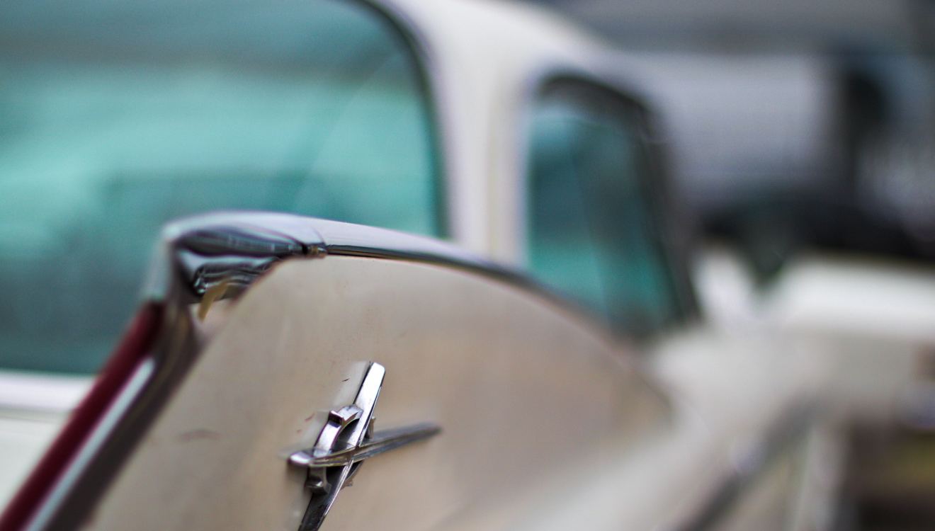Chrome emblem on a classic Chevrolet