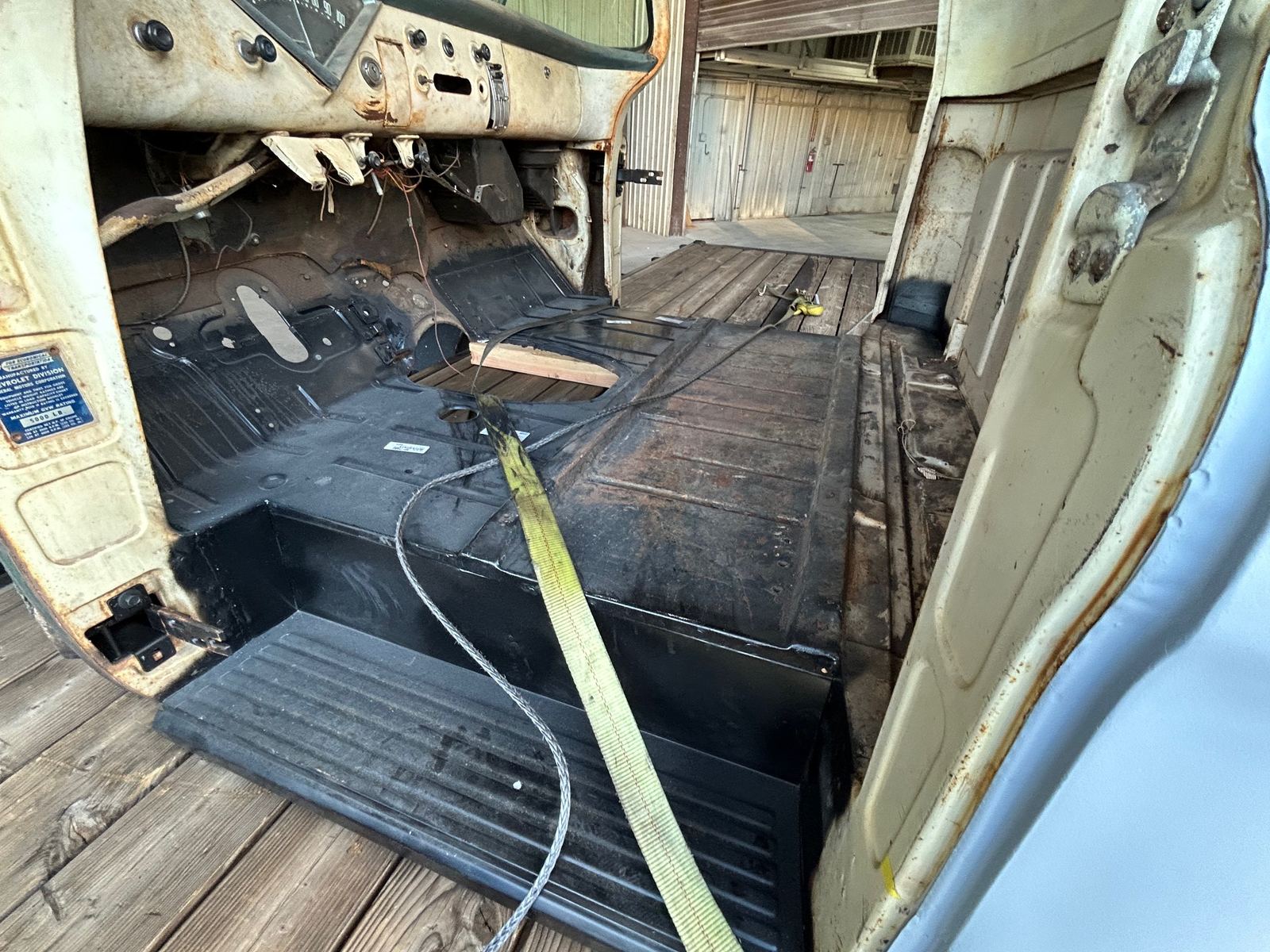 New floor pans welded into a 1950s Chevrolet pickup cab