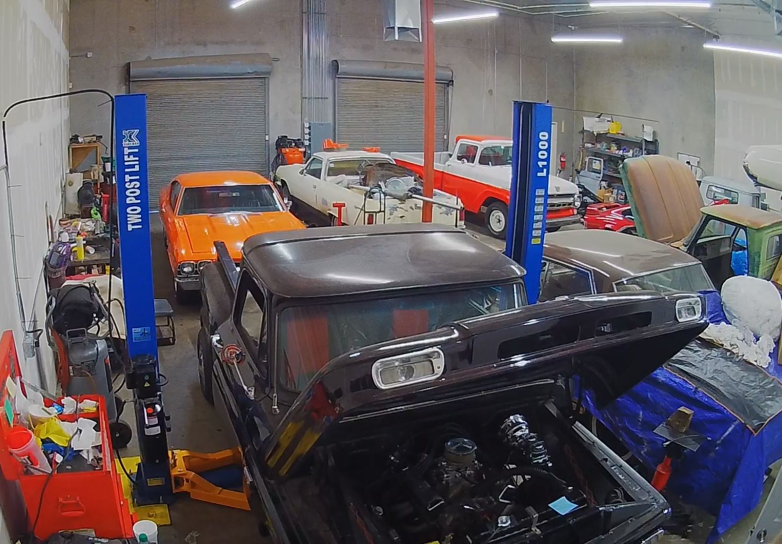 Classic cars and trucks inside the Tucson shop